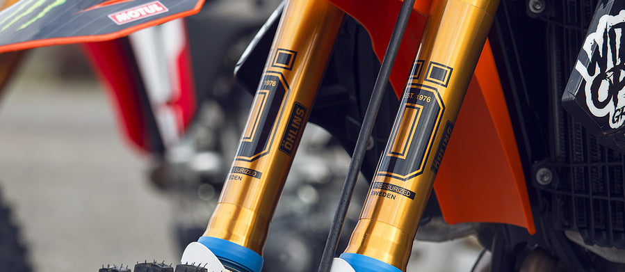 Gold Ohlins Forks on a motocross bike