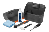 Introducing the Husqvarna Automower Cleaning and Maintenance Kit: This all-inclusive set comes complete with a plastic container, grey dustpan, blue cloth, cleaning spray bottle, handheld brush, small white block, scraper tool, and screwdriver. Perfect for maintaining your Husqvarna automower with ease and keeping it in top condition.