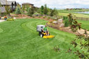 A yellow and gray Walker T23 Zero Turn Collection Mower with a 48-inch cutting deck. The mower features a high-back black seat, large rear wheels, and a compact, zero-turn design with the brand name "Walker" prominently displayed for efficiently manicured lawns.