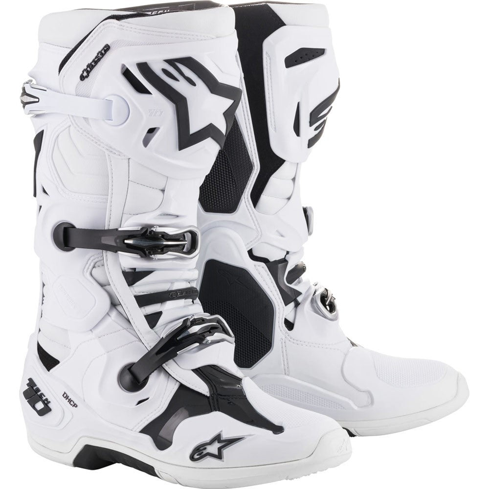 The Alpinestars Tech-10 MX Boots White by Crown Kiwi Enterprises Limited are lightweight motocross boots in white and black, featuring an angular design with multiple buckles, prominent branding, reinforced protective areas, and a Dynamic Heel Compression Protector for style and safety.
