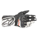 A black, white, and red road glove with reinforced knuckles and detailed stitching, featuring the ALPINESTARS logo and the designation "Stella SP-8 v3" on the wrist area. The bike glove is positioned horizontally, showing the palm and fingers.
