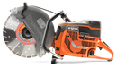 A Husqvarna K1270-16 17" Power Cutter with an orange and black body, large circular blade, and ergonomic handle. The brand logo is visible on the tool. Ideal for heavy-duty cutting tasks, this robust machine is perfect for both construction sites and outdoor projects like maintaining lawns.