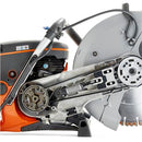 The image shows an orange and gray power tool, specifically a Husqvarna K970 - 14" MK3 concrete saw, ideal for heavy-duty cutting tasks. Its large circular blade and handle ensure precise maneuvering outdoors, making it perfect for maintaining lawns and other outdoor projects.
