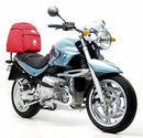 The image features the BMW R 850 R (02-04) Bike-Pack Kit by Ventura in sleek black with a striking orange stripe, highlighting the adjustable Evo-Rack bike rack. It includes a generic L-bracket with screws and bolts for secure attachment.