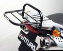 The Ventura EVO-12 Bike-Pack Kit for BMW F 650 GS Dakar Twin Spark (04-07) includes a black EVO-12 pack, Adjustable Pack-Rack EVO-rack mounted on the bike, and L-Brackets with screws, all shown in a generic image.
