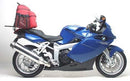 Ventura’s Bike-Pack Kit for BMW K 1200 S (05-08, no factory rear carrier) features a black EVO-12 pack, an Evo-Rack on a bike, and an L-bracket with screws—clearly shown together in a generic image.