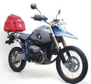 The Ventura EVO-12 Bike-Pack Kit for the BMW HP2 Enduro (06-10) features a sleek black and orange bag, versatile EVO-RACK, and durable black metal L-BRACKETS with screws. Its adjustable Pack-Rack design ensures a secure fit for adventurous journeys.