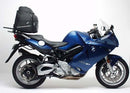 The image showcases components of the Ventura EVO-12 Bike-Pack Kit for BMW F800 ST (07-13): a black bag labeled "EVO-12 PACK," a metal Sport-Rack marked "EVO-RACK," and L-Brackets with screws, all crafted to enhance your biking experience.