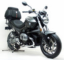 The image depicts the Ventura EVO-12 Bike-Pack Kit featuring a sleek black pack branded "EVO-12 PACK" with the versatile "Evo-Rack." Additionally, it includes metal brackets and screws, labeled as a generic "L-Bracket" assembly, compatible with BMW R 1200 R (07-14).