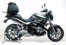 The image depicts the Ventura EVO-12 Bike-Pack Kit featuring a sleek black pack branded "EVO-12 PACK" with the versatile "Evo-Rack." Additionally, it includes metal brackets and screws, labeled as a generic "L-Bracket" assembly, compatible with BMW R 1200 R (07-14).