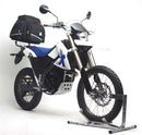 The Ventura EVO-12 Bike-Pack Kit for BMW G 650 X Challenge (07-09) features an adjustable Pack-Rack with the EVO-12 pack, Evo-Rack, and L-bracket. The sleek black pack has an orange stripe, while the metal rack and bracket include mounting hardware for easy installation.
