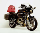 The image showcases Ventura's Buell 1200 S3T Thunderbolt Bike-Pack Kit, including the black EVO-12 pack, sturdy EVO-RACK metal bike rack, and versatile L-BRACKET parts—ideal for cycling enthusiasts seeking efficient storage solutions.