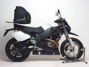 The image features a Ventura EVO-12 Bike-Pack Kit for the Buell 1200 Lightning Super TT XB12STT (2007), showcasing the EVO-12 pack, a black storage bag with a red stripe, an EVO-Rack, rear bike rack, L-Bracket with screws, and an Adjustable Pack-Rack for added utility.