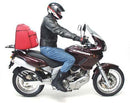The Ventura EVO-12 Bike-Pack Kit for Cagiva 1000 Navigator Y (00-05) includes a black EVO-12 Pack, adjustable Evo-Rack rear bike rack, and L-Bracket with screws—each item shown with labeled images.