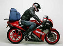 The image features the Ventura EVO-12 Bike-Pack Kit for Honda VFR 400 R3-L. R3-M, comprising a black bike pack with an orange stripe labeled EVO-12 Pack, a durable black metal Sport-Rack, and an L-Bracket with screws for secure mounting.