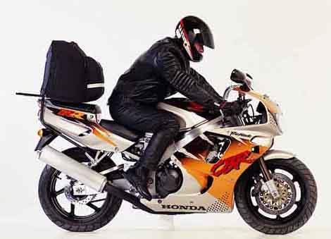 Image shows a Ventura EVO-12 Bike-Pack Kit for Honda CBR 900 RRR/RRS/RRT/RRV, including a black bike-pack, Evo-Rack rear bike rack fitted to the motorcycle, and an L-bracket with mounting hardware. Generic image shown.