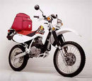 The Honda XR 650 L, W bike-pack kit from Ventura features a black EVO-12 pack with a red stripe and pocket, an Adjustable Pack-Rack made of sturdy black metal for secure holding of the pack, and an L-bracket displayed with fittings underneath.