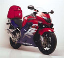 The EVO-12 Bike-Pack Kit image includes a black bike pack labeled 'EVO-12 PACK', an 'EVO-RACK' sport-rack on a Honda CBR 600 FX-03 by Ventura, and metal brackets with screws labeled 'L-BRACKET Generic Image'.