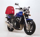 The image features the Ventura EVO-12 Bike-Pack Kit on a Honda CB 400F, highlighting the sleek black EVO-12 Pack with a zipper and strap. An Evo-Rack is mounted on the bike, complementing the included L-Bracket with screws.