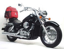 The image showcases the Ventura Evo-12 Bike-Pack Kit for the Honda VT 750 Shadow C4 (05-13), including a sleek black EVO-12 pack with a logo, versatile Sport-Rack, and L-Bracket. It features metal rods and screws for secure bike attachment.