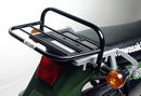 The Ventura EVO-12 Bike-Pack Kit for the Kawasaki KLR 650 includes a sleek black bike-pack, an EVO-rack attached to your bike frame, and a specifically labeled L-bracket with screws, all presented alongside a generic image.