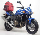 The image showcases a Ventura Kawasaki Z 750 (04-05) Bike-Pack Kit featuring a black EVO-12 pack and an adjustable EVO-Rack attached to a motorcycle. It also includes an L-bracket with screws and fittings, highlighting the kit's versatile setup.