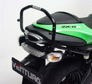 The image highlights three components of the EVO-12 Bike-Pack Kit: a sleek black EVO-12 pack, an Adjustable Pack-Rack securely mounted on a Kawasaki ZX-6R 600 (07-08), and an L-Bracket with screws—all elegantly labeled as Ventura.