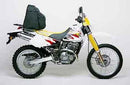 Collage of Suzuki DR 250 RV accessories by Ventura. Top left: EVO-12 Pack, a sleek black storage bag with a zipper. Top right: Evo-Rack, featuring a horizontal Sport-Rack platform for easy transport. Bottom: L-Bracket with sturdy black metal support rods and screws for secure installation.