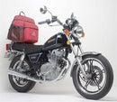 The image shows a sleek black Ventura EVO-12 Bike-Pack with orange accents labeled "EVO-12 Pack," paired with the versatile "Adjustable Pack-Rack." Also included are the sturdy "EVO-Rack" and "L-Bracket Generic Image" for Suzuki GN 250 (83-07).