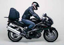 Image showing the Ventura EVO-12 Bike-Pack Kit for Suzuki TL 1000 S V-Y (97-00), including an EVO-12 pack, Evo-Rack, and L-bracket with mounting hardware—ideal for use with any Adjustable Pack-Rack system.