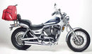 The Ventura EVO-12 Bike-Pack Kit for Suzuki VS 1400 GLP Intruder (96-06) includes a black EVO-12 pack, an Evo-Rack mounted on the motorcycle, and a generic image of an L-bracket with screws and hardware.