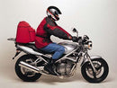 Image showing three labeled components of the Ventura EVO-12 Bike-Pack Kit for Suzuki GSF 250 V X Bandit: EVO-12 pack (black bag), Evo-Rack Top-Box Rack on bike, and a black L-Bracket with screws.