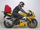 Image featuring three parts for the Suzuki GSXR 750 Y, K1, K2 (00-02) by Ventura: EVO-12 Pack (black zippered bag), Evo-Rack adjustable pack-rack (metal rear rack), and an L-Bracket with mounting hardware.