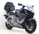 Ventura EVO-12 Bike-Pack Kit for Suzuki GSX 1300 R X - K7 Hayabusa (99-07): includes a black EVO-12 pack, Evo-Rack Top-Box Rack on bike, and generic L-Bracket with screws image.