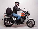The Ventura EVO-12 Bike-Pack Kit for Triumph Thunderbird Sport 900 (98-04) includes a black EVO-12 Pack, Evo-Rack, and L-brackets with screws, providing versatile cargo solutions for your motorcycle.