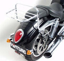 Ventura Triumph Rocket III 2300 (05-14) Bike-Pack Kit: features a black EVO-12 pack, an Evo-Rack Adjustable Pack-Rack mounted on the motorcycle, and a metal L-bracket with mounting hardware, all clearly labeled.