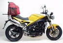 Image showing the Ventura EVO-12 Bike-Pack Kit for Triumph Speed Triple 1050 (05-10) with three labeled components: the black EVO-12 pack, Evo-Rack mounted on a bike, and L-Bracket with screws.