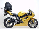 Image showing three Ventura accessories for Triumph Daytona Triple 675 (09-12): EVO-12 pack (black zippered bag), Evo-Rack Adjustable Pack-Rack (installed on bike), and L-Bracket ("Generic Image," black metal bracket with screws).