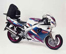 Image showing the Ventura EVO-12 Bike-Pack Kit for Yamaha FZR 1000 B, E with three items: EVO-12 Pack (black zippered bag), Evo-Rack Sport-Rack (metal bike rack), and L-Bracket with mounting hardware.