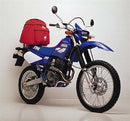 Image showing the Ventura EVO-12 Bike-Pack Kit for Yamaha TT 250 R (99-13), including an EVO-12 pack (black bag), Evo-Rack sport-rack (bike rack), and L-Bracket set, each clearly labeled.