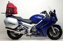Image showing three Ventura bike accessories for Yamaha FJR 1300 N - T (01-05): EVO-12 Pack (black bag), Evo-Rack (rear rack), and L-Bracket (with screws). Title: EVO-12 Bike-Pack Kit. Ideal for adding a Top-Box Rack to your ride.