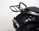 Image displaying a Ventura Buell 1125R (08-09) Bike-Pack Kit featuring a black EVO-12 pack with an orange accent, an Evo-Rack expertly mounted on the bike, and an L-bracket with screws, all presented as a generic image for versatility.