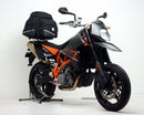 Image shows the Ventura EVO-12 Bike-Pack Kit for the KTM 950 Super Moto R, including a black EVO-12 pack with zippers, an adjustable EVO-Rack mounted on a bike, and an L-Bracket with screws.