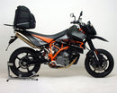 Image shows the Ventura EVO-12 Bike-Pack Kit for the KTM 950 Super Moto R, including a black EVO-12 pack with zippers, an adjustable EVO-Rack mounted on a bike, and an L-Bracket with screws.