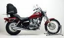 Image of a Ventura EVO-12 Bike-Pack Kit showing a sleek black and gray EVO-12 pack with an adjustable Pack-Rack, an EVO-RACK securely fitted to a Kawasaki EN 500 Vulcan (08-09), and an L-bracket with screws.