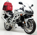 Ventura EVO-12 Bike-Pack Kit for Suzuki SV 650S K3-L2 (03-12) includes a black EVO-12 Pack cargo bag, Evo-Rack rear rack, and L-Bracket metal brackets with screws—ideal for secure mounting and versatile storage.