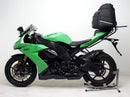 The image showcases a Ventura Bike-Pack Kit for the Kawasaki ZX-10R 1000 (2010), featuring a sleek EVO-12 pack, robust Pack-Rack with easy mounting, and sturdy L-bracket complete with bolts and screws. The black carrying case complements the metal structure for functionality and style.
