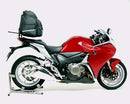 Image showing a Ventura EVO-12 Bike-Pack Kit for Honda VFR 1200F (10-16) with a black "EVO-12 PACK" bag, metal Evo-Rack rear rack, and black L-brackets with hardware labeled "L-BRACKET Generic Image." Compatible with Top-Box Rack setups.