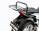 Image showing a Ventura EVO-12 Bike-Pack Kit for Honda VFR 1200F (10-16) with a black "EVO-12 PACK" bag, metal Evo-Rack rear rack, and black L-brackets with hardware labeled "L-BRACKET Generic Image." Compatible with Top-Box Rack setups.