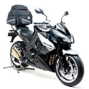 The image showcases the Ventura EVO-12 Bike-Pack Kit, featuring a sleek black pack on an Evo-Rack mounted on a motorcycle. It includes an L-bracket with hardware, all presented without specific branding for the Kawasaki Z 1000 (10-12).